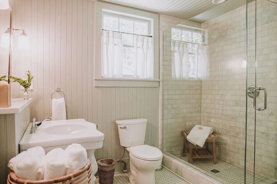 Full bathroom with walk-in shower shared between the two King bedrooms