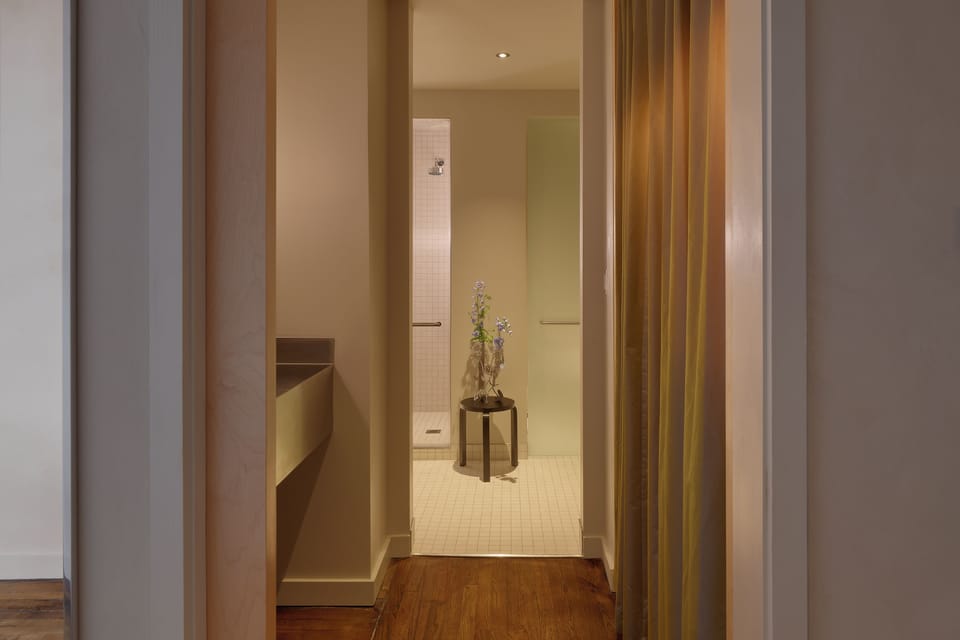 Bathing Studio | Hypo-allergenic bedding, down comforters, in-room safe, blackout drapes