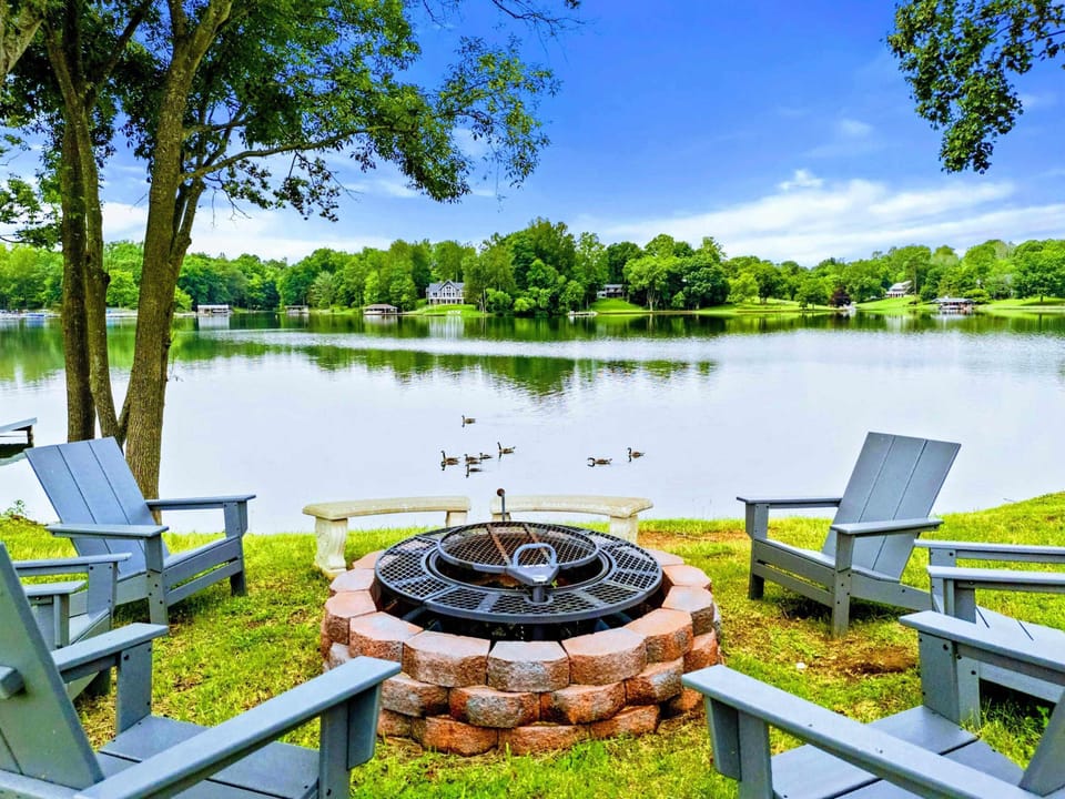 Lakeside Fire Pit - Pull up an Adirondack chair, watch the ducks glide by, and let the evening settle in around the fire.