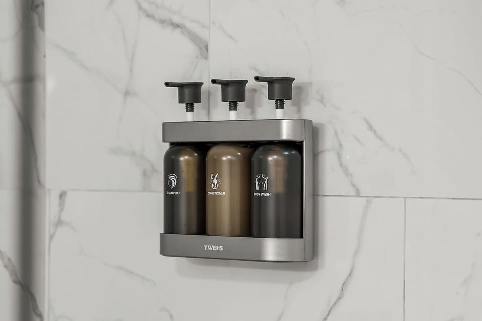Enjoy hotel-style convenience with wall-mounted shampoo, conditioner, and body wash in both full bathrooms. Clean, modern, and thoughtfully stocked for a comfortable stay at our Panama City Beach condo. 🧴✨