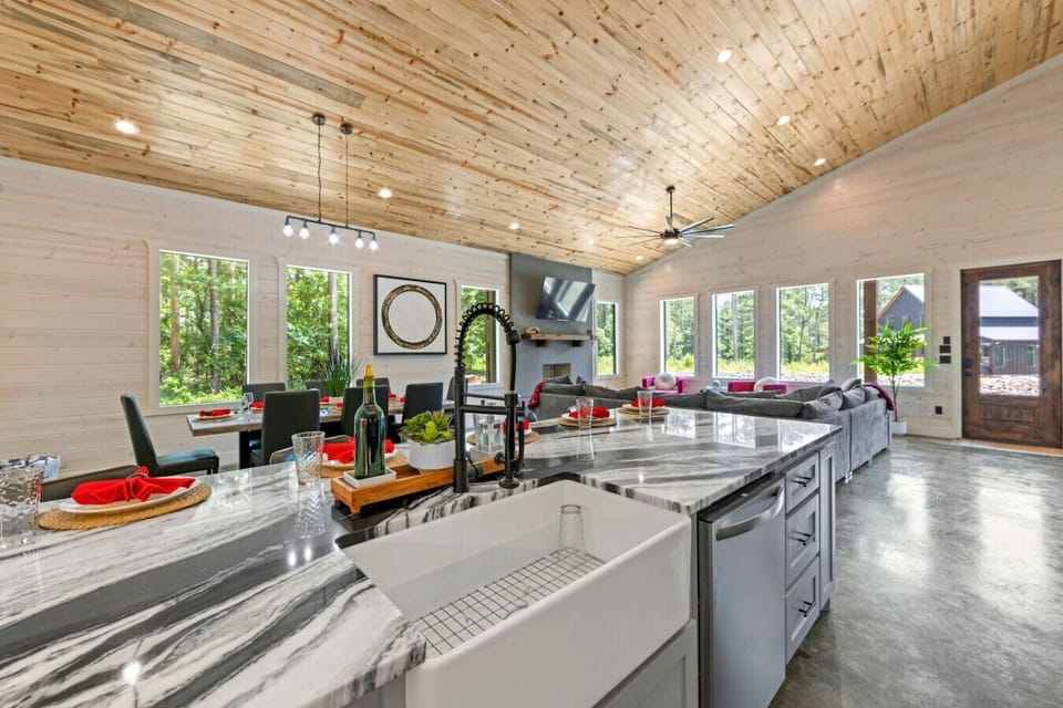 Open spaces. Warm finishes. Endless light. ✨ Whether you`re cooking, dining, or lounging, this space brings everyone together in style.