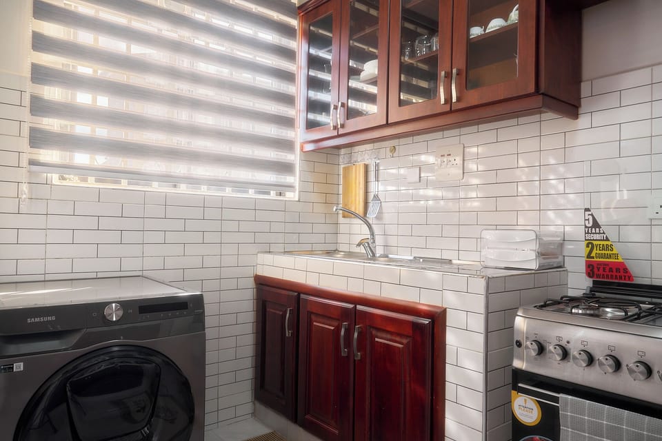 Economy Apartment, City View | Private kitchen | Fridge, microwave, oven, cookware/dishes/utensils