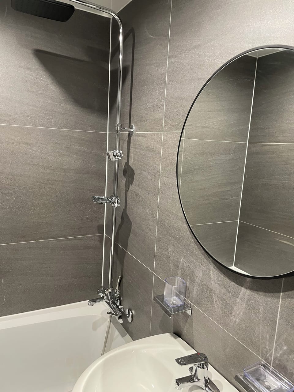 Classic Quadruple Room, Multiple Beds (Self Check-in) | Bathroom | Hair dryer, slippers, towels, shampoo
