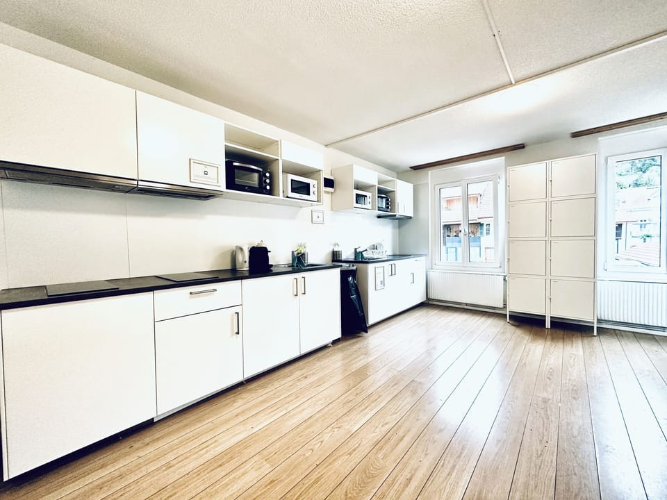 Mini-fridge, microwave, stovetop, cookware/dishes/utensils