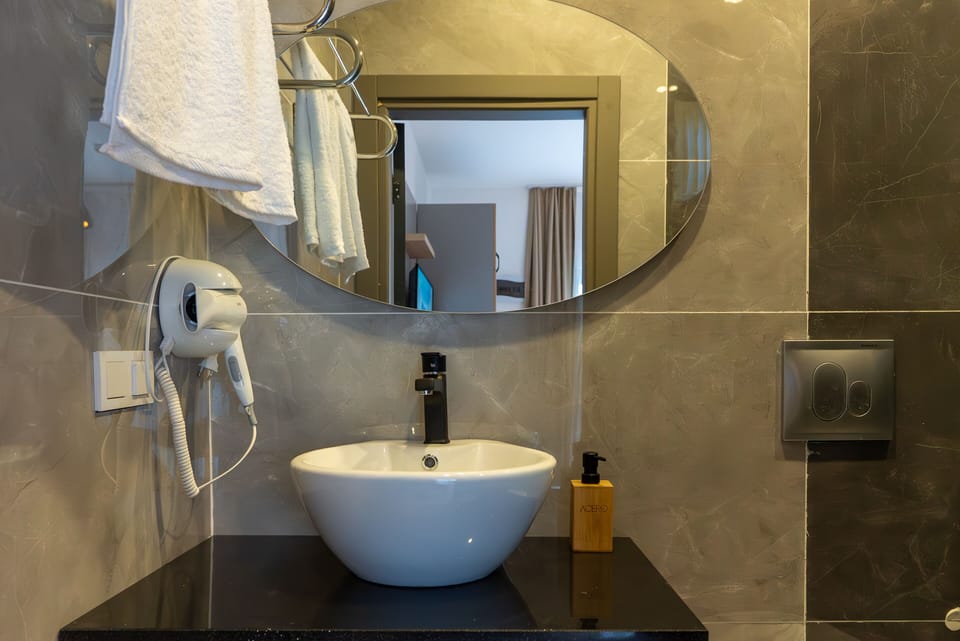 Shower, hair dryer, bathrobes, slippers