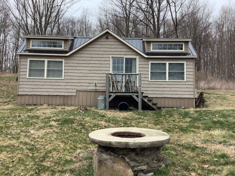 Savor stunning lake views from the porch, luxurious hot tub, cozy firepit, or manicured lawn. Enjoy the ideal backdrop for relaxation and unforgettable moments.
