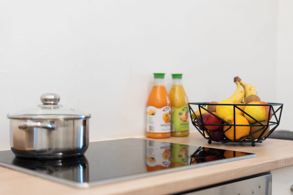 Design Apartment, Pets Allowed, City View | Private kitchen | Espresso maker, coffee/tea maker, electric kettle, dining tables