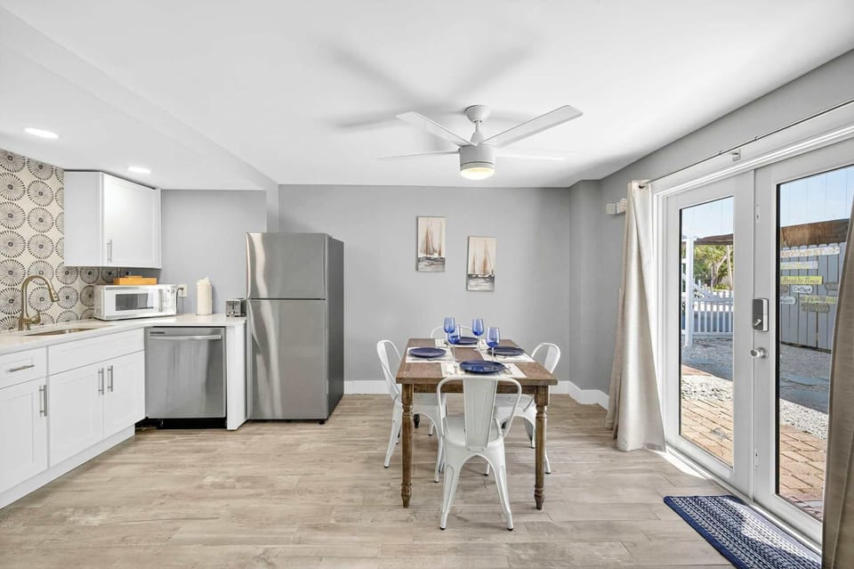 Light bright and beachy kitchen and dining area.