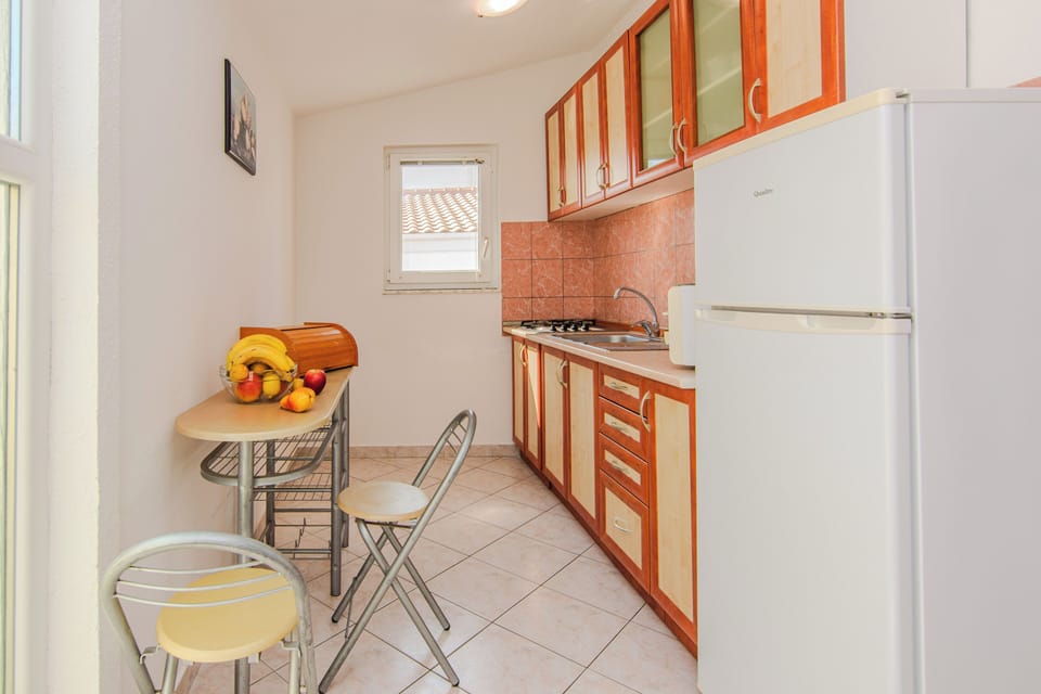 Standard Apartment, Balcony, Partial Sea View | Private kitchen | Full-size fridge, microwave, oven, stovetop