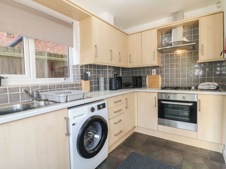 Fridge, microwave, cookware/dishes/utensils