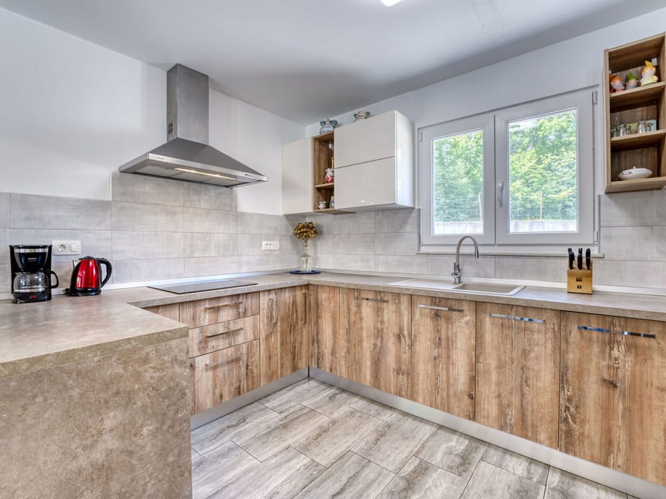 Wood, Cabinetry, Countertop, Kitchen, Flooring, Home, Major Appliance, Cupboard, Wood Stain, Room