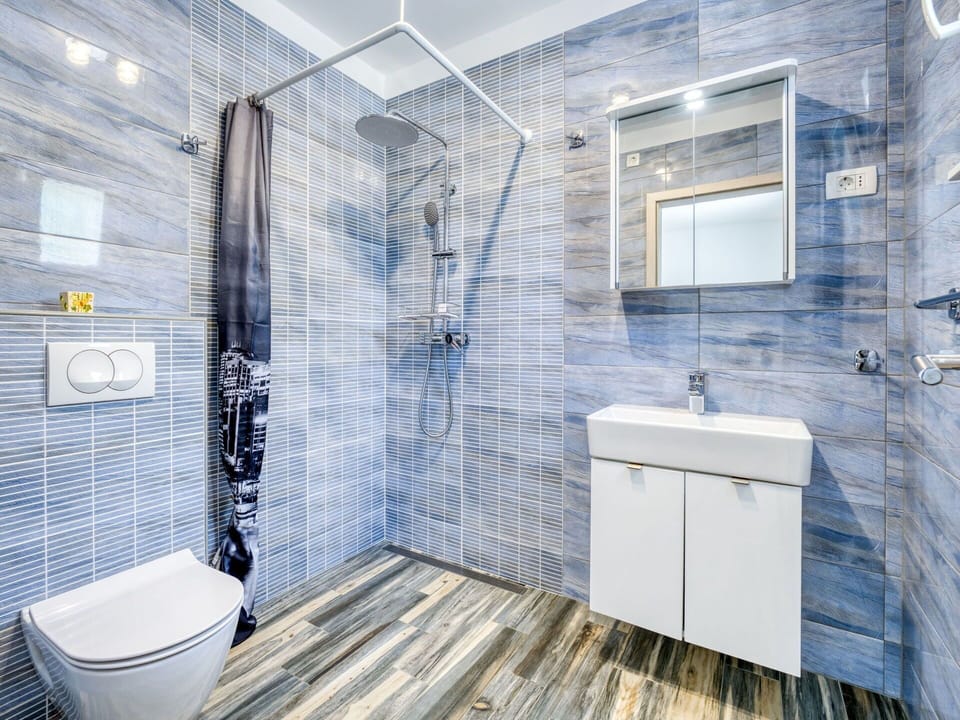 Flooring, Floor, Composite Material, Plumbing Fixture, Tile, Plumbing, Bathroom, Toilet, Sink