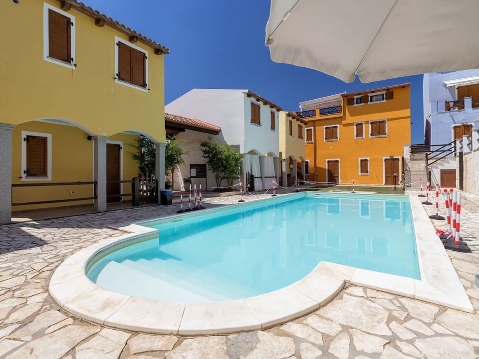 Swimming Pool, Town, Residential Area, Home, Human Settlement, Composite Material, Resort, Outdoor Furniture, Sunlounger, Hotel