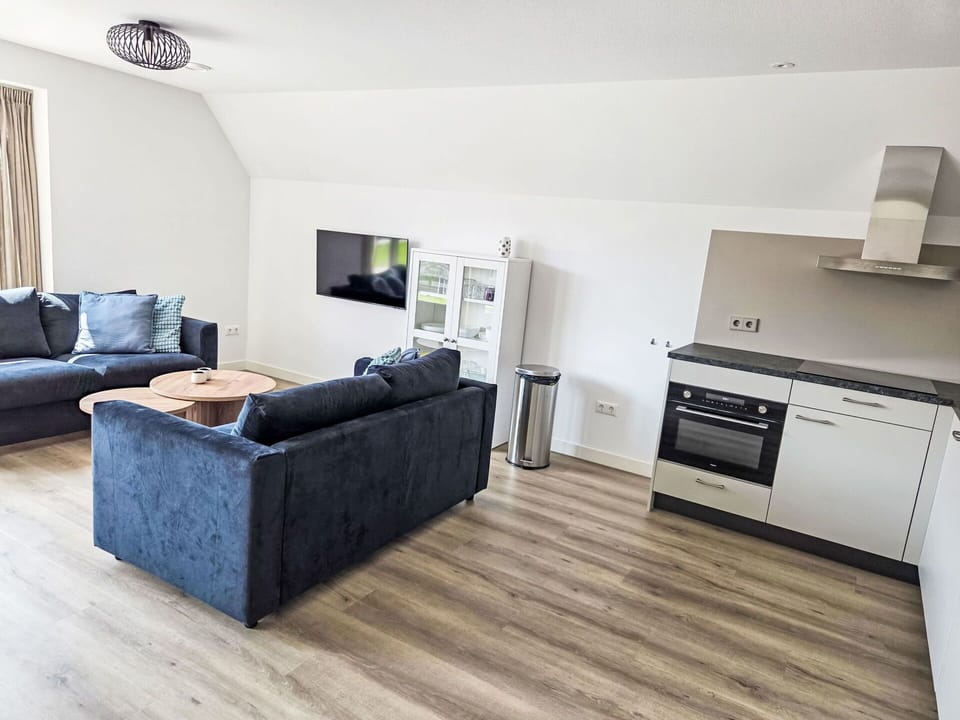 Furniture, Interior Design, Flooring, Floor, Couch, Wood, Room, Wood Flooring, Ceiling, Living Room