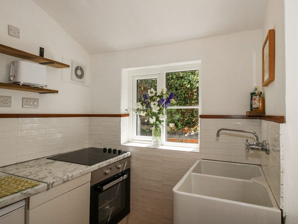 Fridge, toaster, cookware/dishes/utensils
