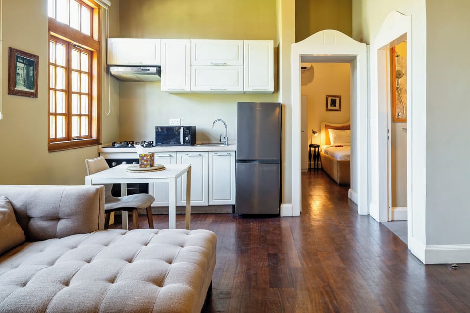Executive Suite, Pool View | Living area | LED TV