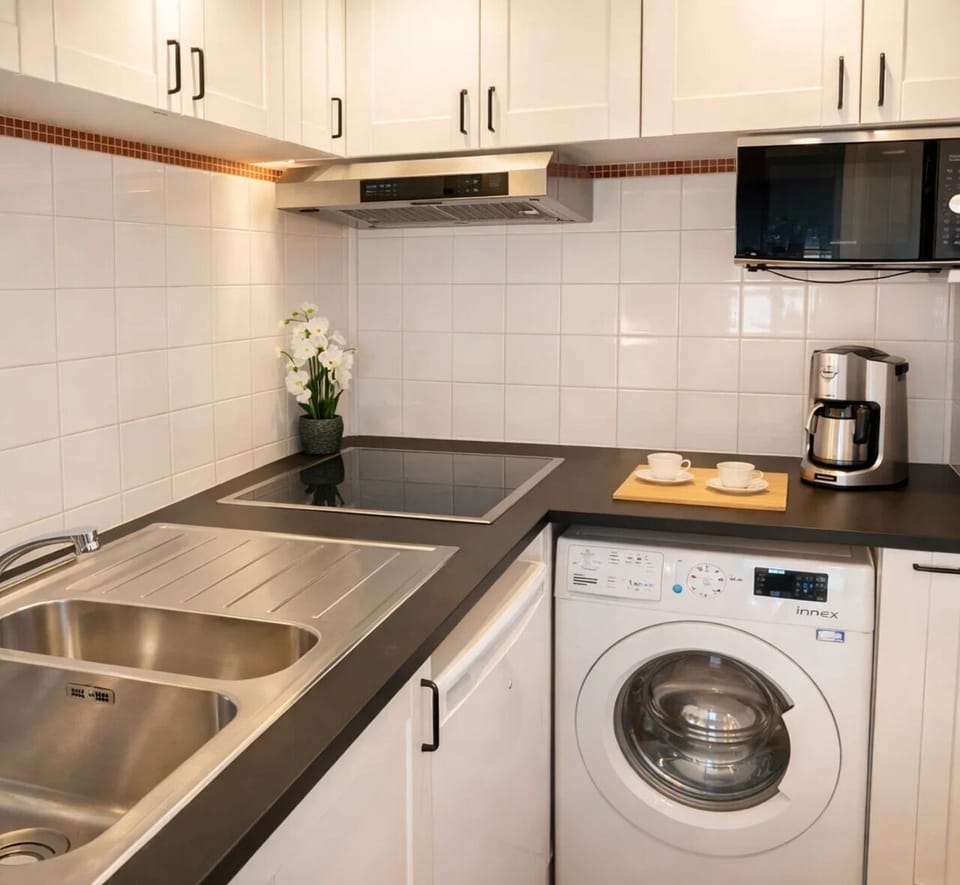 Standard Apartment, Courtyard View | Private kitchen | Espresso maker, electric kettle, toaster, freezer