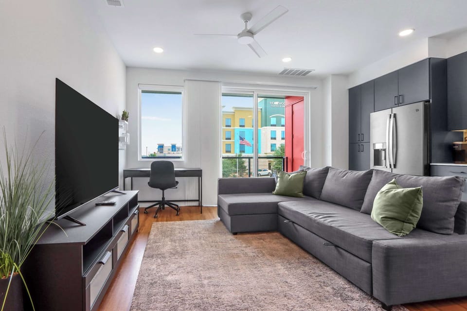 Condo, 1 Queen Bed with Sofa bed, Balcony (Creekside Modern) | Living area | 42-inch flat-screen TV with digital channels