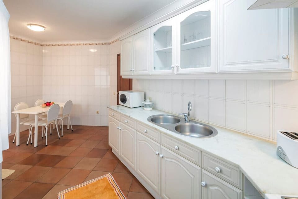 Kitchen with additional dining table