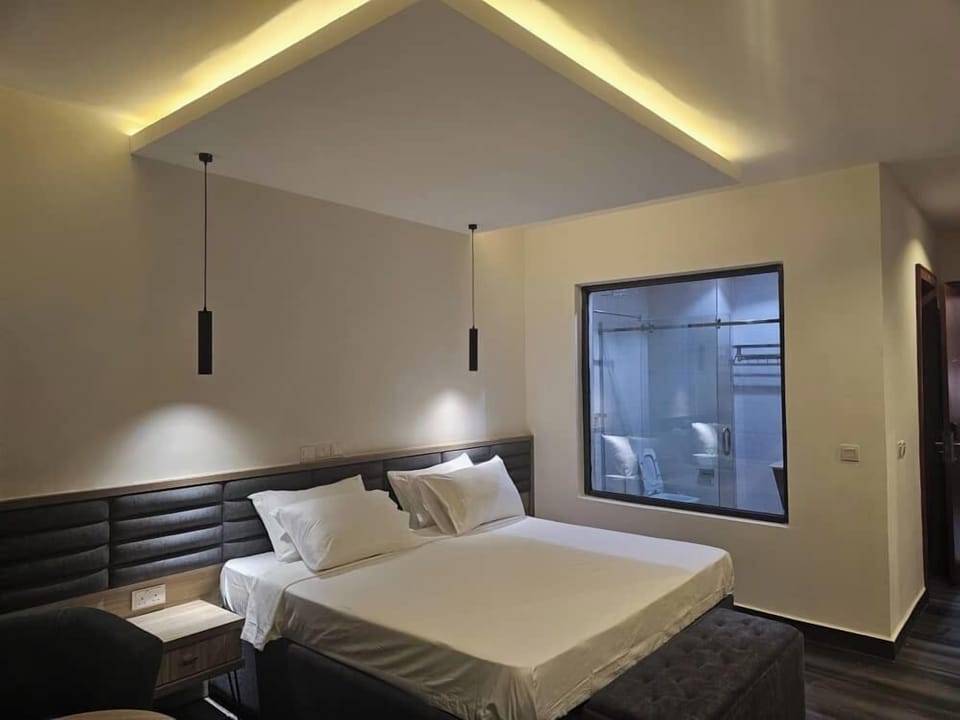 Junior Room, Balcony, City View | Desk, laptop workspace, blackout drapes, soundproofing