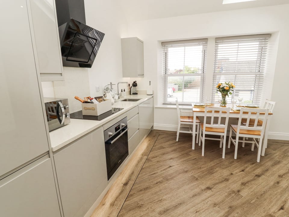 Fridge, microwave, cookware/dishes/utensils
