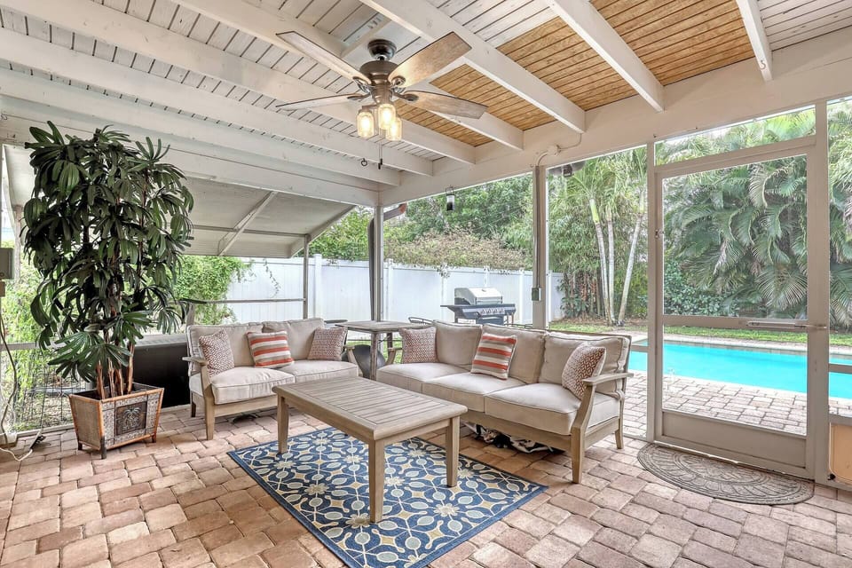 Enjoy shaded comfort in the stylish outdoor lounge - perfect for morning coffee.