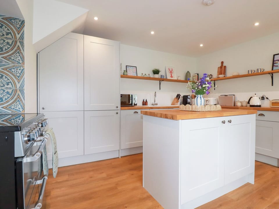 Fridge, dishwasher, toaster, cookware/dishes/utensils