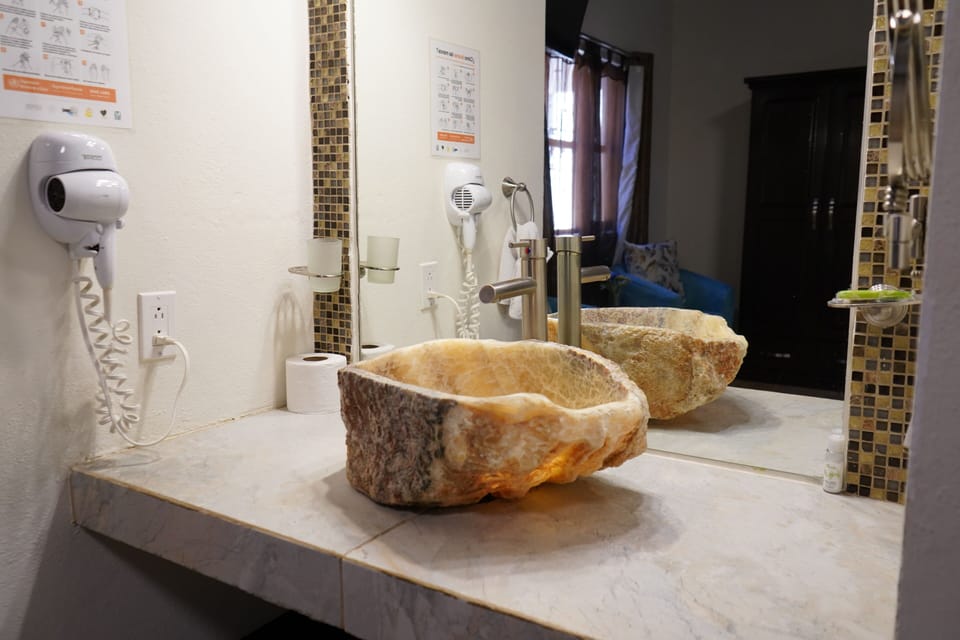 Junior Suite | Bathroom | Hair dryer, towels, soap, shampoo