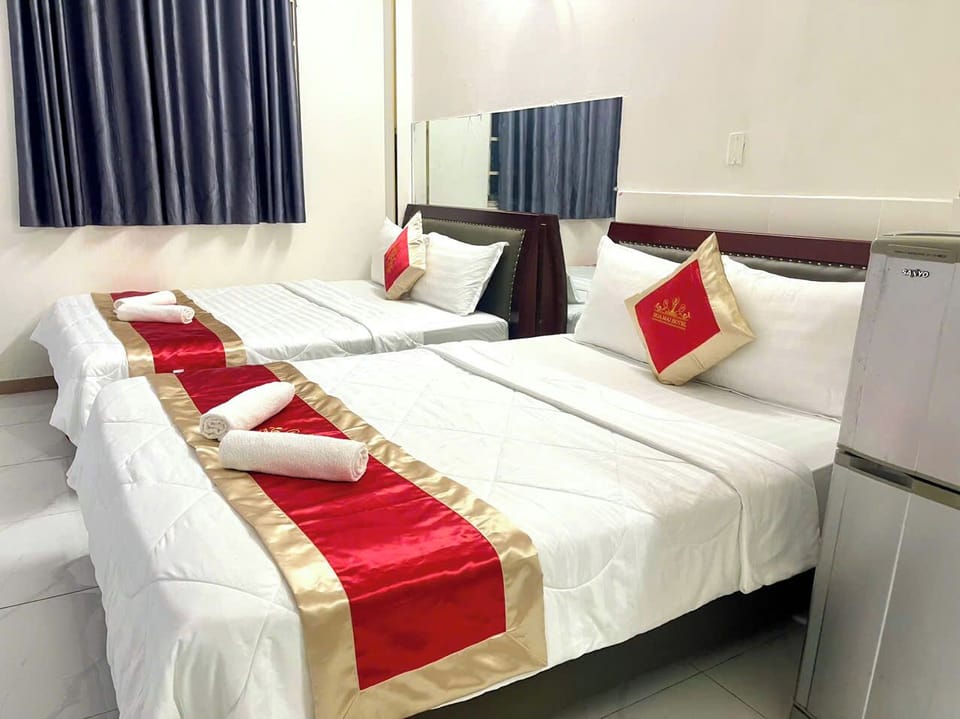 Family Quadruple Room, Balcony, City View | Premium bedding, down comforters, pillowtop beds, individually furnished