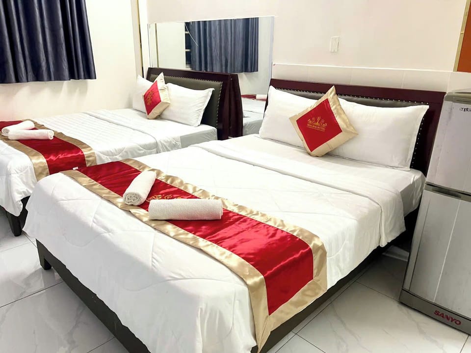 Family Quadruple Room, Balcony, City View | Premium bedding, down comforters, pillowtop beds, individually furnished
