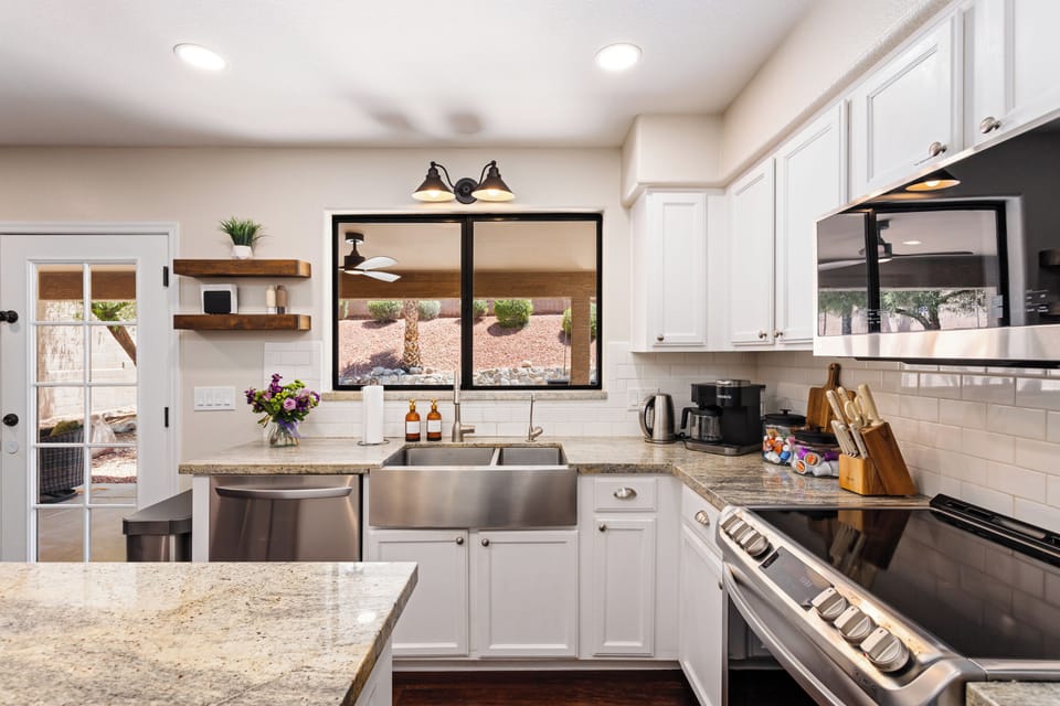 Kitchen: Opens to family room and backyard oasis