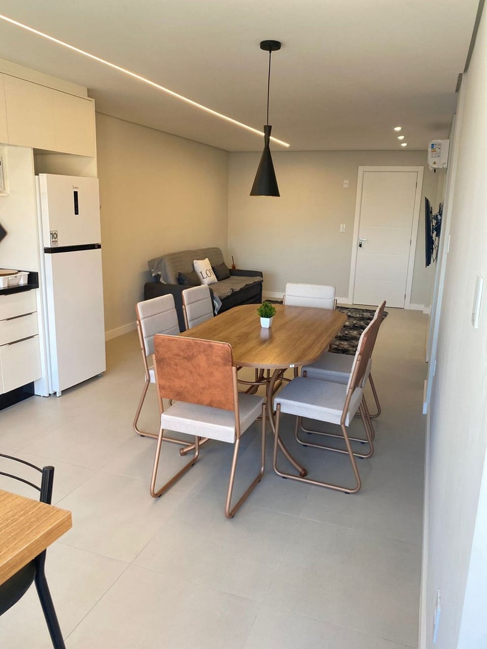 Apto Pérola de Penha Próximo ao Beto Carrero - SC | Living area | 50-inch Smart TV with digital channels, Netflix, streaming services