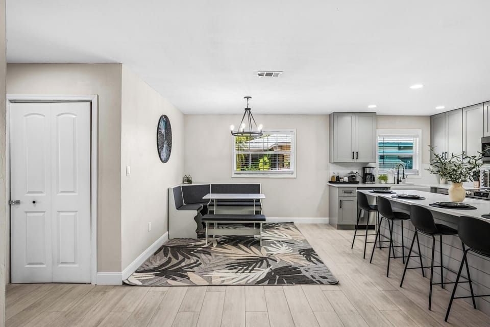 Bright and airy space with stylish seating, perfect for meals and morning chats!