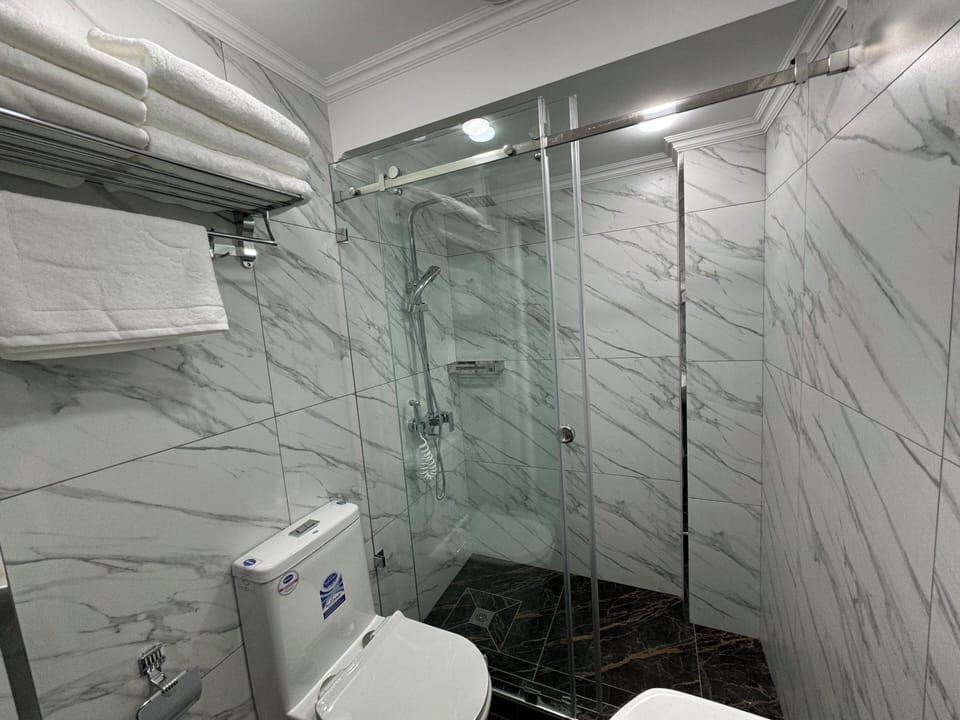 Deluxe Double or Twin Room, City View | In-room safe, laptop workspace, blackout drapes, soundproofing
