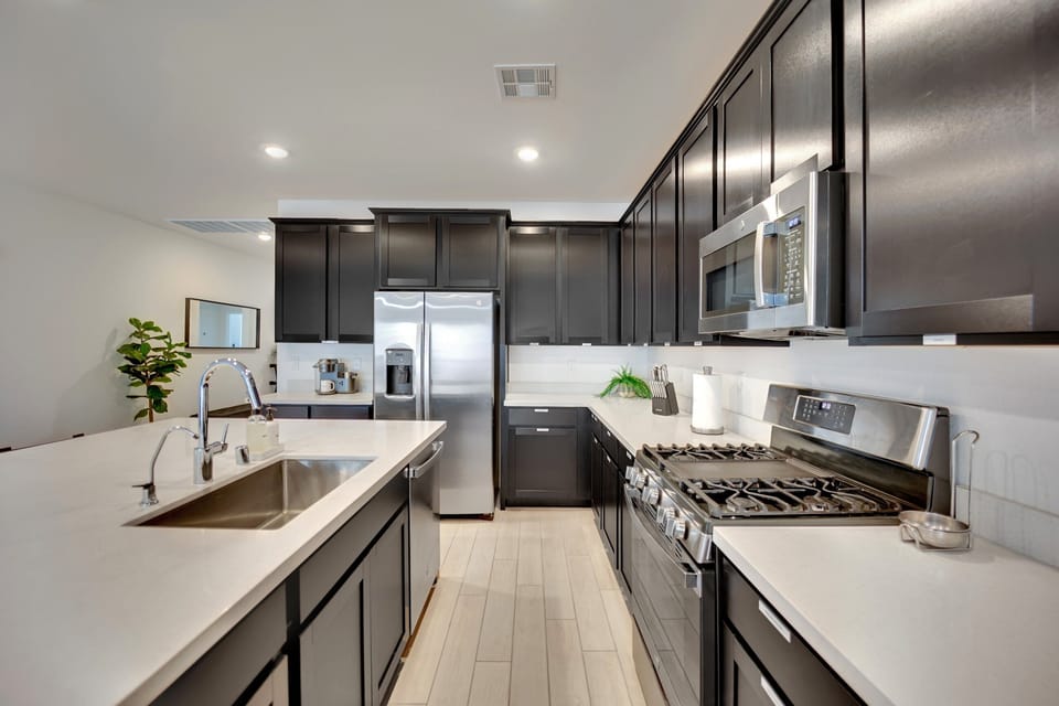 Open flow from kitchen to dining makes entertaining a breeze.