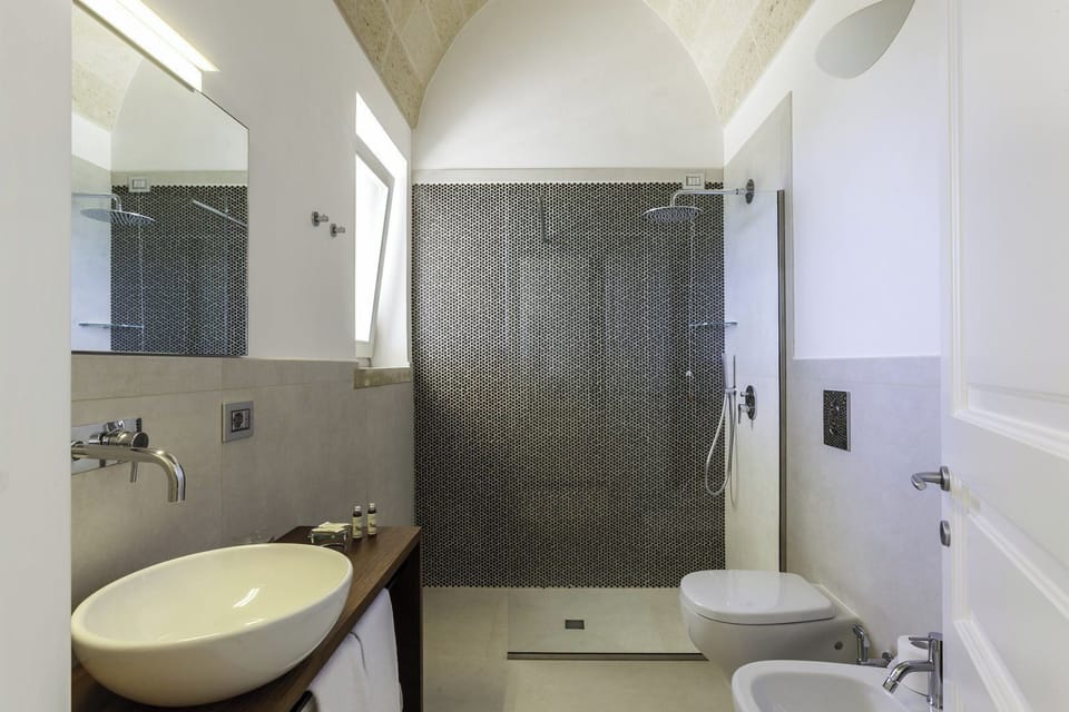 Superior Room, Patio | Bathroom | Shower, free toiletries, hair dryer, bathrobes
