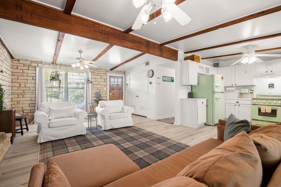 Living room opens to kitchen
