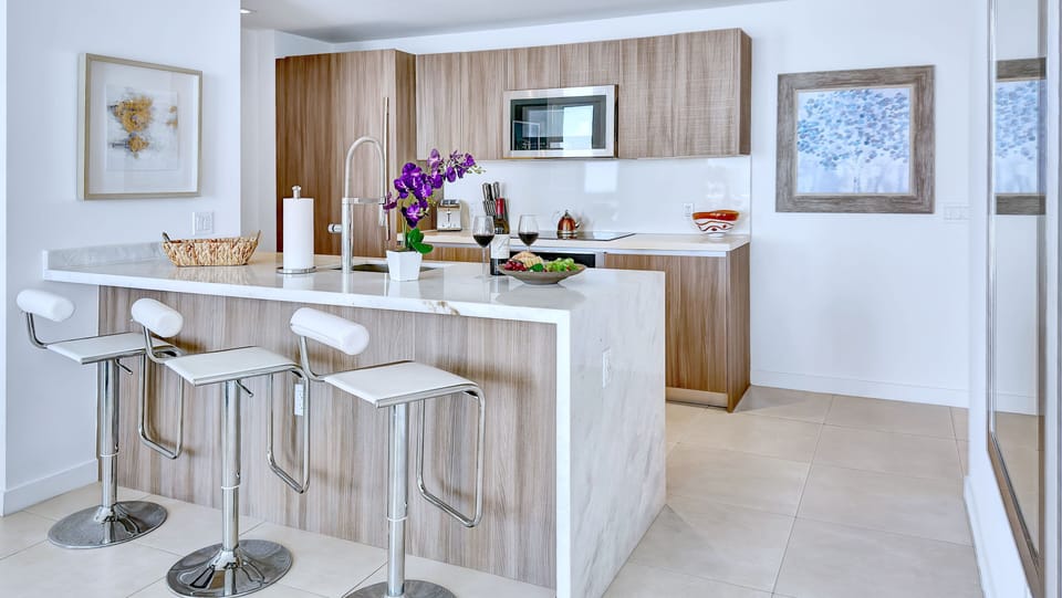 Kitchen | Modern appliances + counter seating.
