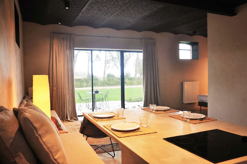 Design Studio, 2 Bedrooms, Refrigerator, Garden View | Living area | Flat-screen TV