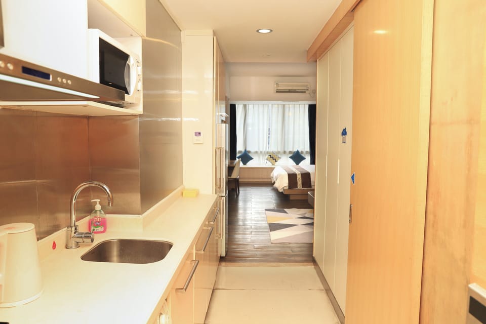 Luxury Double Room, City View | Desk, laptop workspace, blackout drapes, soundproofing
