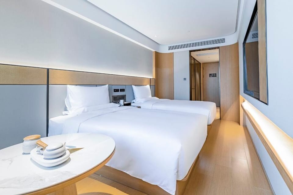 Comfort Twin Room, City View | Desk, blackout drapes, soundproofing, iron/ironing board