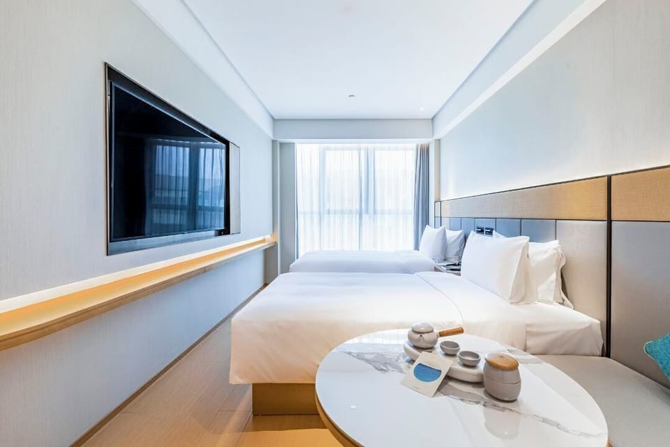Comfort Twin Room, City View | Desk, blackout drapes, soundproofing, iron/ironing board