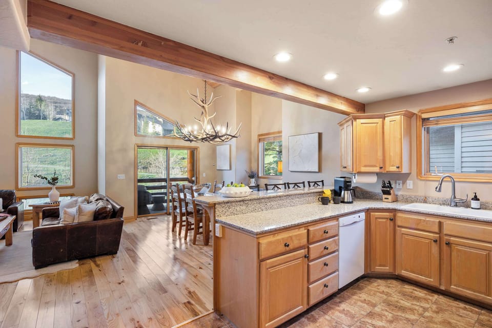 Open Layout Design – Seamless flow from kitchen to living area.