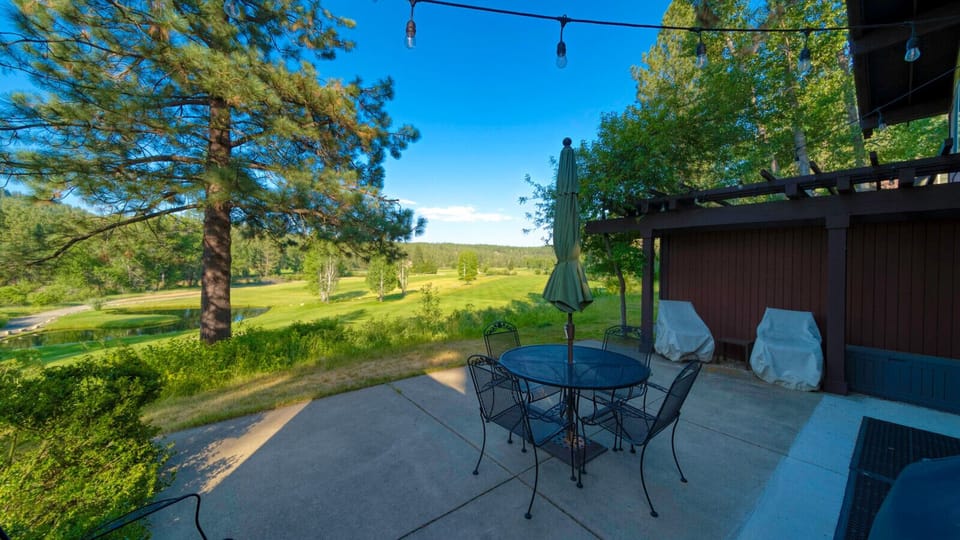 The back patio offers ample seating for entertaining