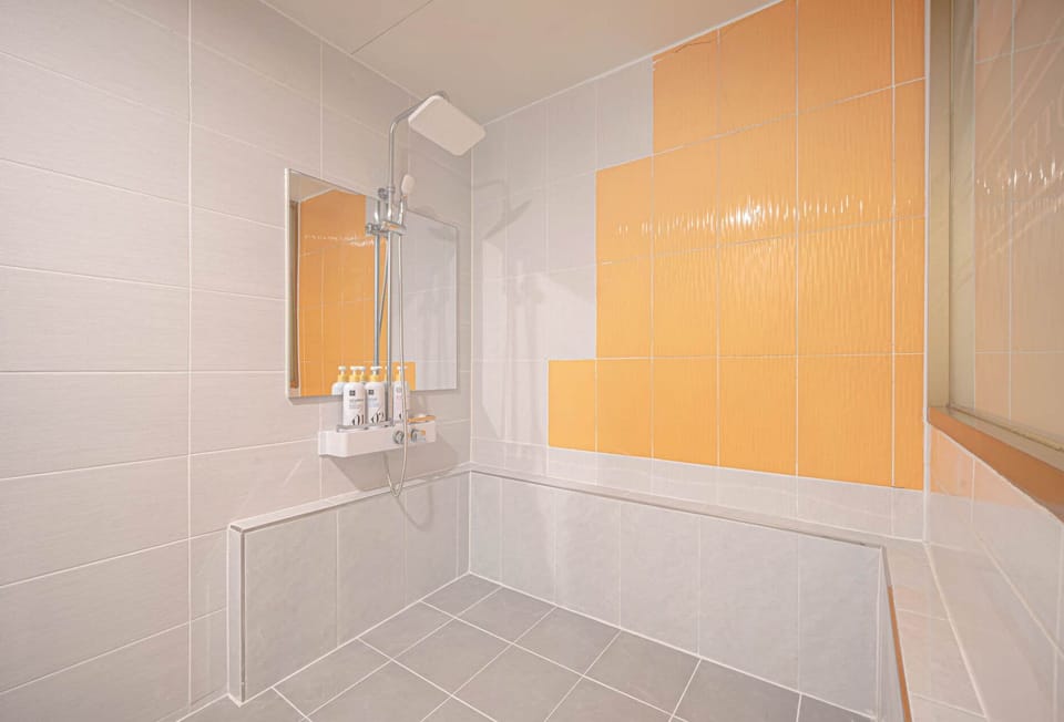 Economy Double Room, City View | Bathroom | Shower, hair dryer, slippers, towels