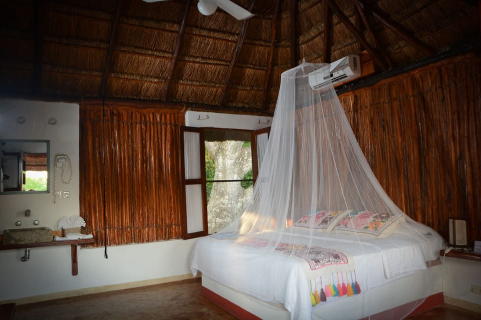 Deluxe Suite, 1 King Bed, Garden Area | 1 bedroom, premium bedding, in-room safe