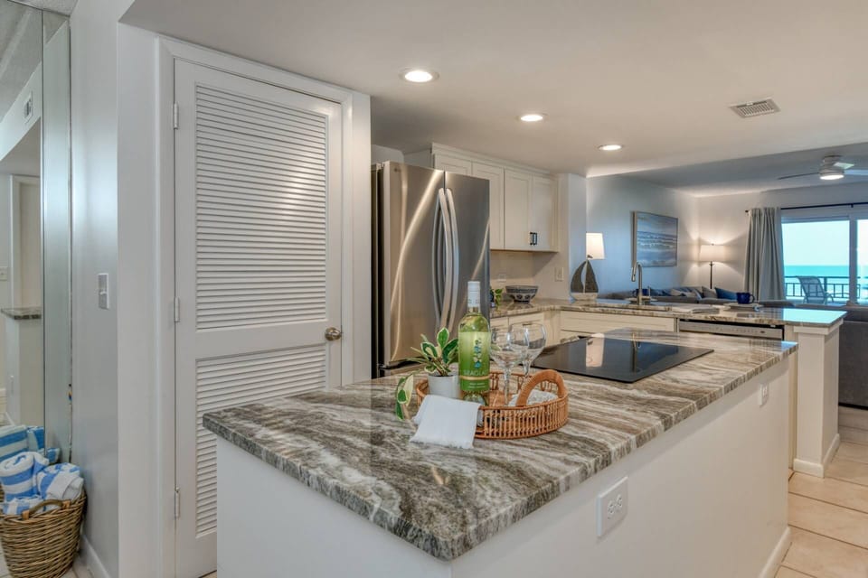 The brand-new kitchen features beautiful finishes and modern appliances.