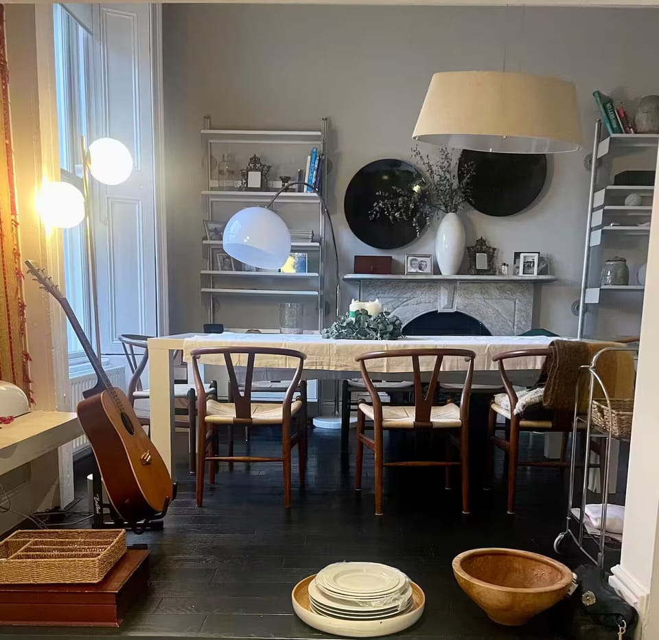 Dining Room accommodates 10 guests & looks down to the kitchen.