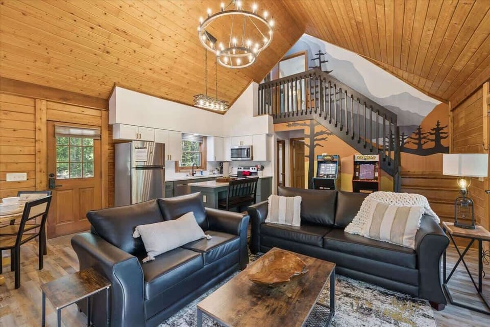 Relax in the open-concept living room with lofted ceilings.