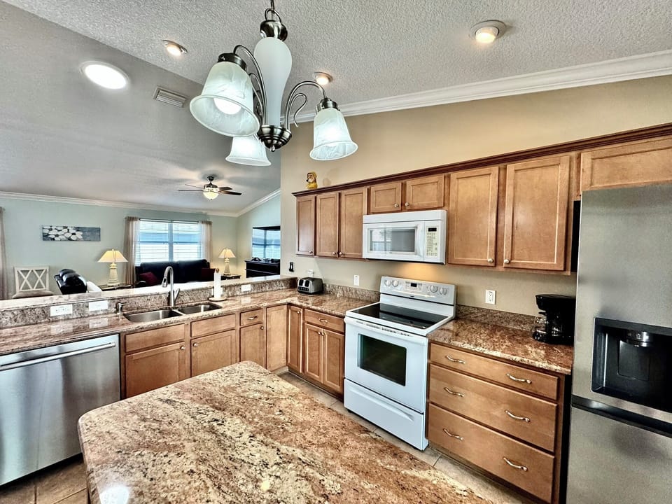  Dishwasher, water/ice dispenser on the fridge and a coffee pot
